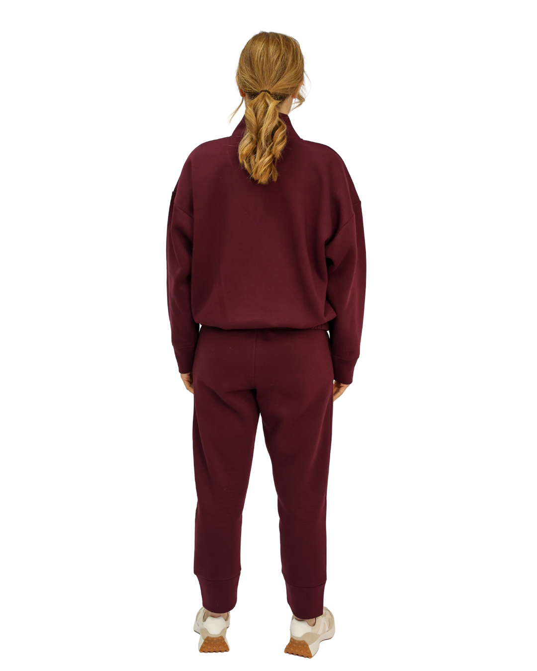 Back of burgundy sweatpants and matching sweatshirt