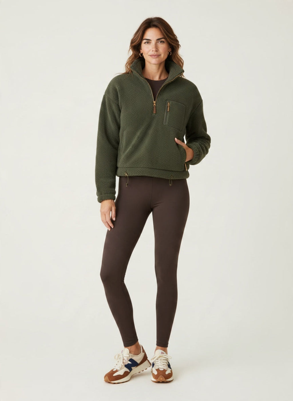 Green half-zip fleece with jersey lining and pocket detail