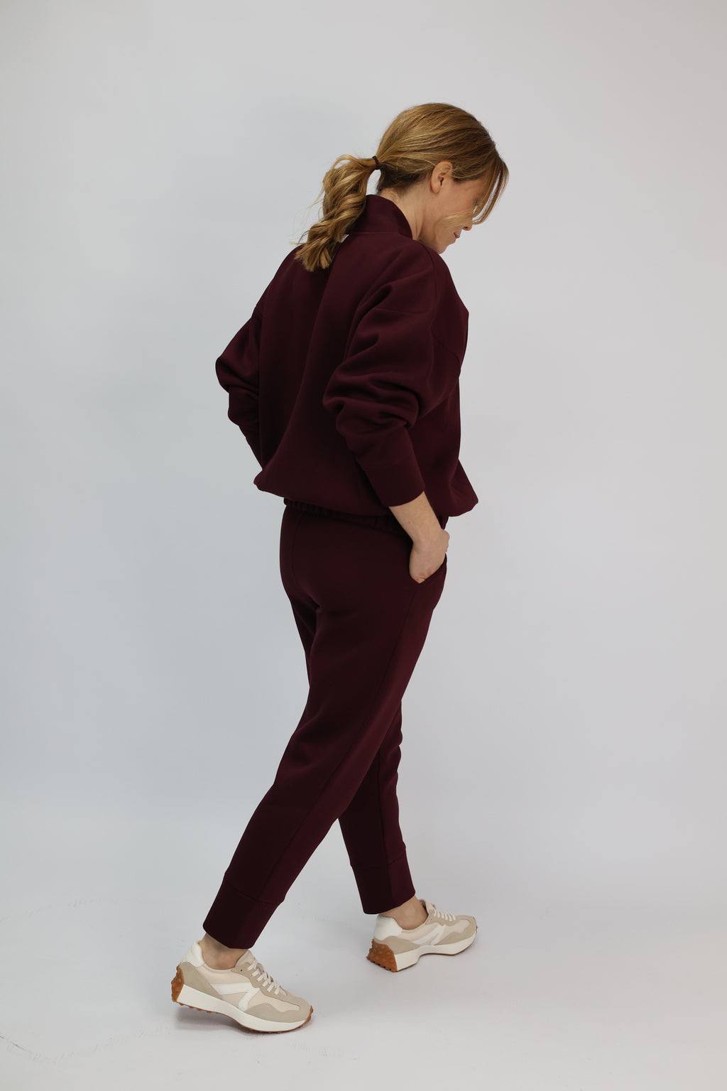 Back view of burgundy sweatshirt and matching joggers