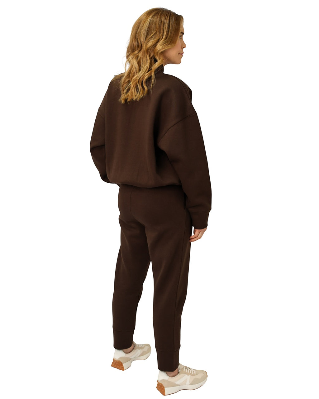 Wild Geese Margot chocolate brown cotton sweatshirt with gold zip detail and relaxed fit, worn by a model.